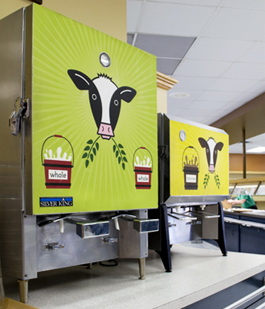 Milk machine graphics with illustrated cows